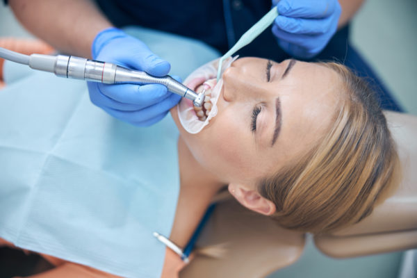 Young woman during dental procedure